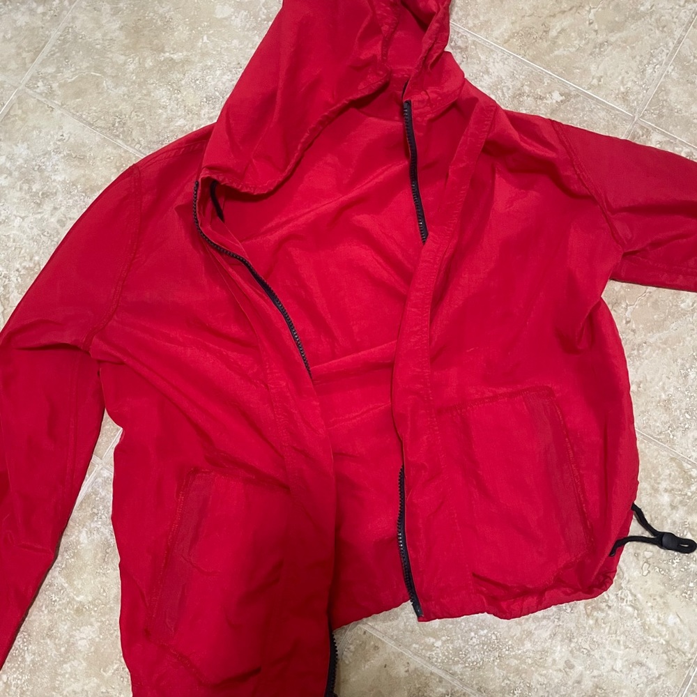 Red cropped rain jacket
